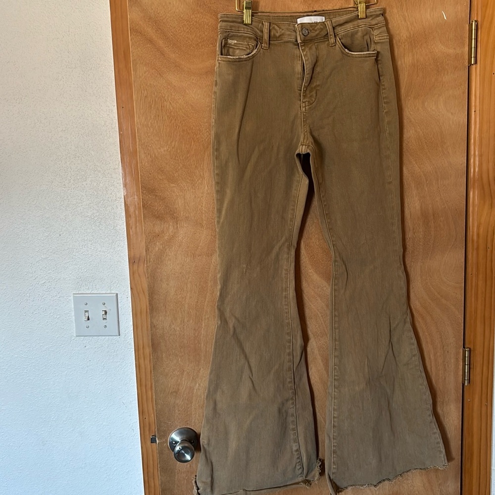 Vervet raw hem flares. Never worn.